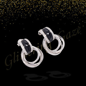 Bold Elegance – Silver & Black Stone Hoop Earrings
