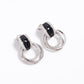 Bold Elegance – Silver & Black Stone Hoop Earrings